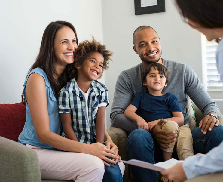 Family happy to be visiting family therapist